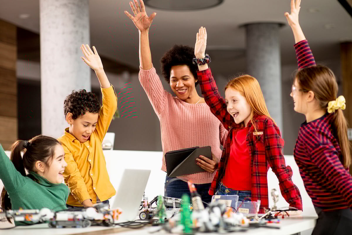 happy-kids-with-their-african-american-female-scie-2022-05-06-02-04-32-utc