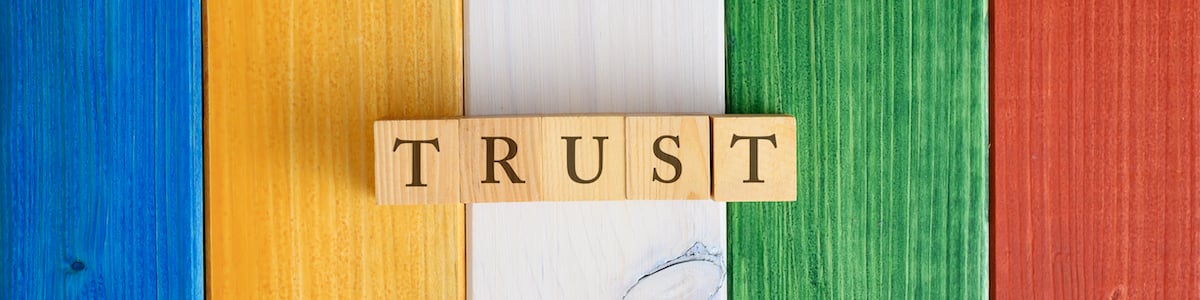 top-view-of-the-word-trust-spelled-on-wooden-cubes-2021-08-30-00-59-21-utc